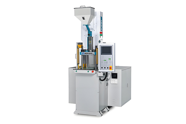 Injection molding machine showing control panel with various parameter settings