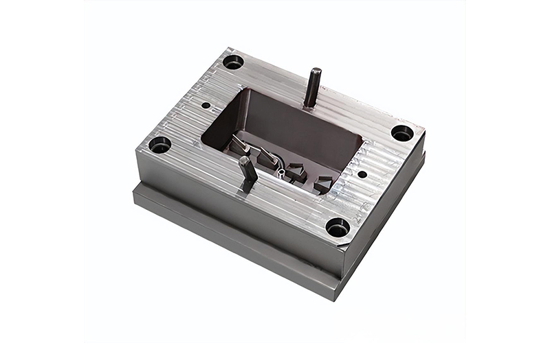 Injection mold showing proper identification markings, quick-connect fittings, safety labels, and accessory storage